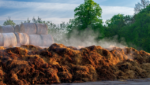 manure composting pile with hay bales